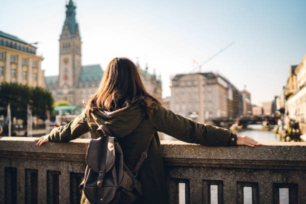 istock Female tourist enjoying view from bridge 1271778047