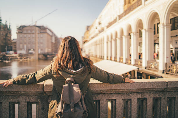 istock Female tourist enjoying view from bridge 1271778081