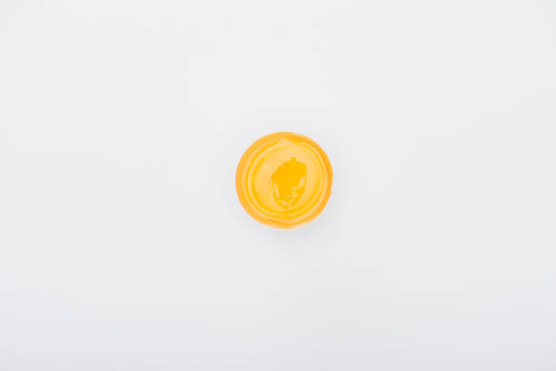 istock top view of fresh chicken egg with yolk isolated on white 1271778698
