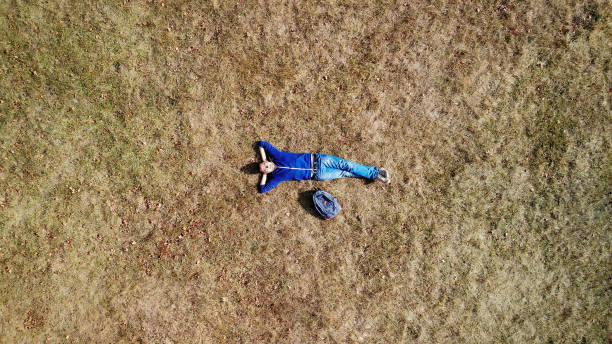 istock Taking a nap in a field 1271778726