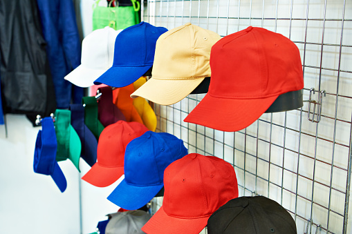 Fashion colored baseball caps on a store display