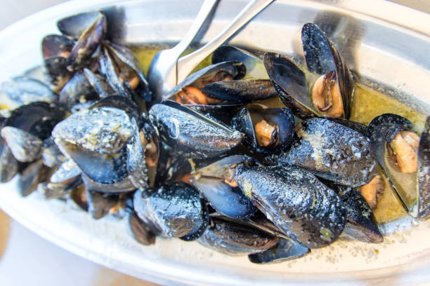 istock Mediterranean mussels with white wine sauce 1271783687