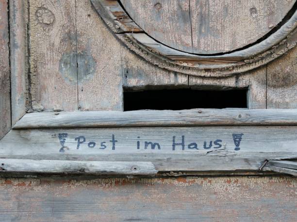 istock Old front door with letter slot 1271784008