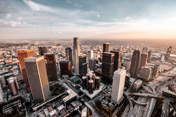 Los Angeles Skyline Beautiful view at Downtown Los Angeles during the helicopter flight at sunset. helicopter point of view photos stock pictures, royalty-free photos & images