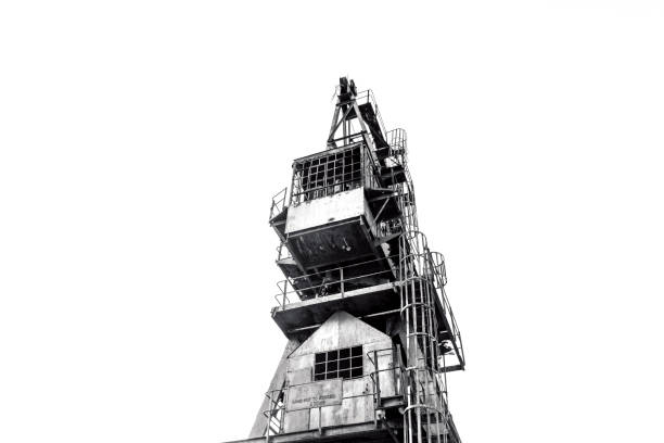 istock Black and white Old antique rusty crane, white background with copy space 1271799468