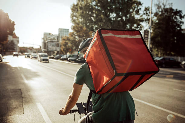 Delivering food on bicycle in city