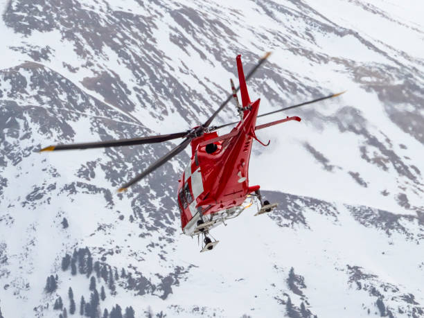 istock Alpine rescue helicopter in winter 1271800093