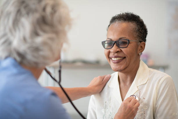 istock Patient smiles during medical checkup 1271801437