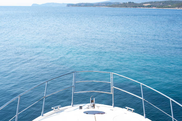 istock Yacht bow against blue sea. 1271805788