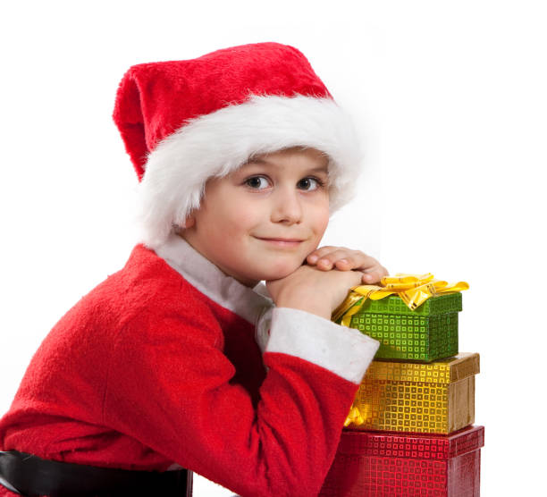 istock Santa Claus holding a christmas gift 1271823158