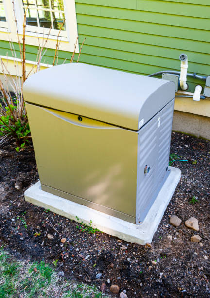 Residential generator Residential standby generator on a concrete pad generator photos stock pictures, royalty-free photos & images