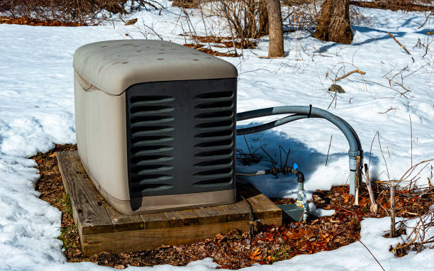 Residential generator Residential standby generator on a concrete pad generator photos stock pictures, royalty-free photos & images