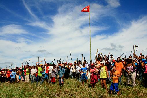 eunapolis, bahia / brazil - april 8, 2009: members of the Movimento Sente Terra - MST - are seen during the occupation of a farm invaded in the rural area of the municipality of Eunapolis.\