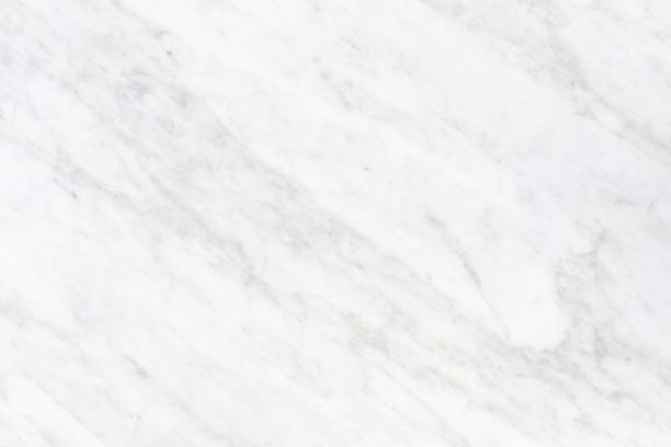 White marble texture for background. White background with white marble texture in top view new and clean surface. Natural stone for architectural decoration both interior and exterior i.e. kitchen countertop, flooring, wall, cladding. on top of stock pictures, royalty-free photos & images