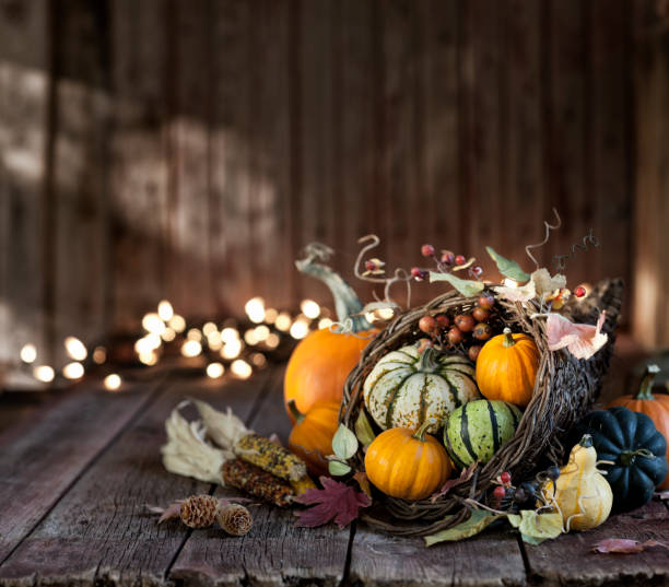 Autumn Thanksgiving Cornucopia on a Wood Background