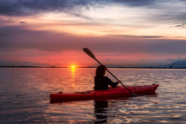 istock Kayaking during a Colorful Sunset 1271851503