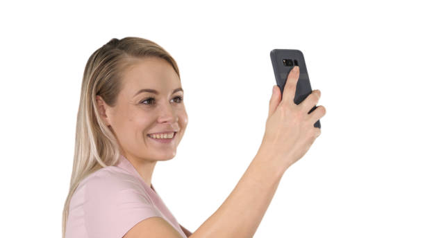 istock Pretty attractive beautiful cute lady making selfie on white background 1271871182