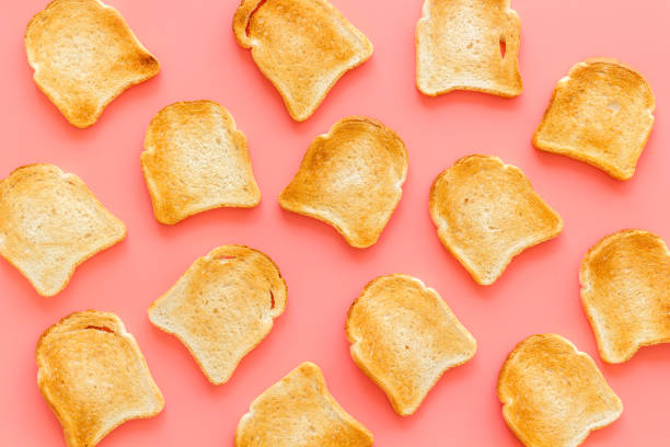 istock Slices of toast bread pattern. Food background. Top view 1271876303