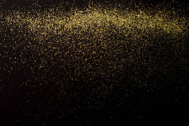 istock Christmas Gold glitter on black background. Holiday abstract 1271876437
