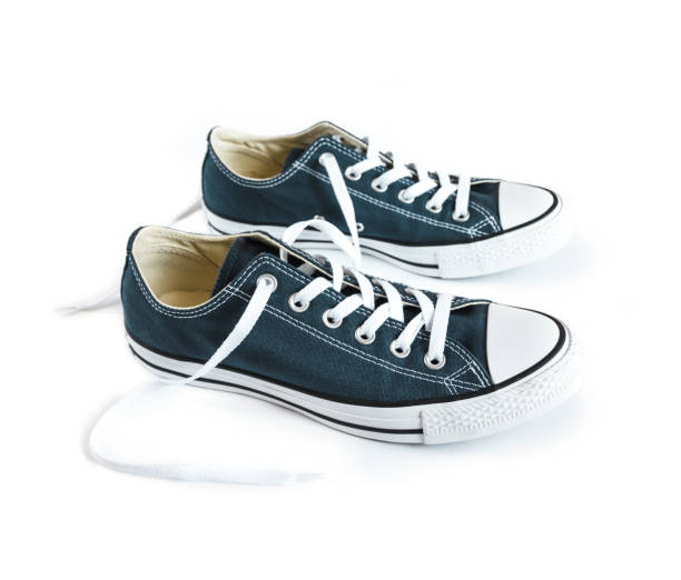 istock Blue sneakers isolated on white background 1271879160