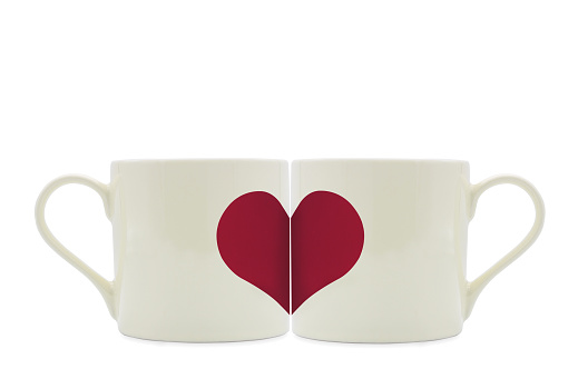 White cup or mug and red heart isolated on white background, Valentine's day concept.