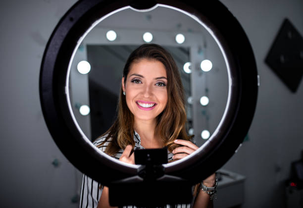 istock Woman applying make-up. 1271881438