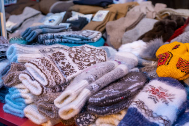istock stall weith knitted wool mittens. Winter clothes accesories. 1271884588