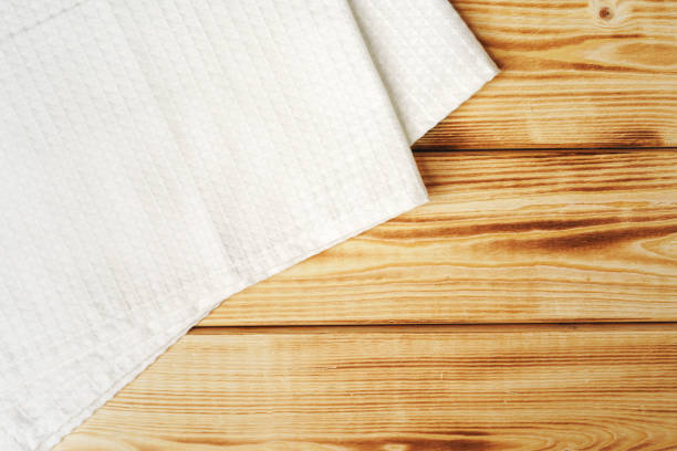 istock Kitchen towel or napkin over the wooden table. 1271884643