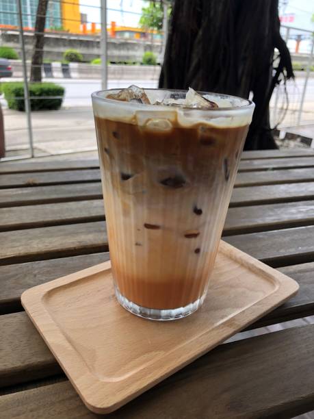 istock selective focus iced espresso with milk and Thai tea in cafe 1271890539