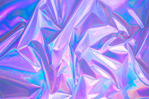 pastel colored holographic background in 80s style Blurred abstract Modern pastel colored holographic background in 80s style. Crumpled iridescent foil real texture. Synthwave. Vaporwave style. Retrowave, retro futurism, webpunk vaporwave photos stock pictures, royalty-free photos & images