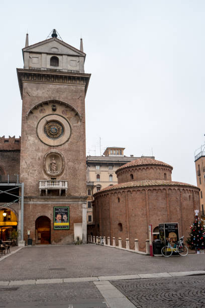 Mantua, Lombardy, Italy, December 2015: The Clock Tower of Rotonda di San Lorenzo church located in Piazza delle Erbe Mantua, Lombardy, Italy, December 2015: The Clock Tower and The church of the Rotonda San Lorenzo located in Piazza delle Erbe. san lorenzo rome photos stock pictures, royalty-free photos & images