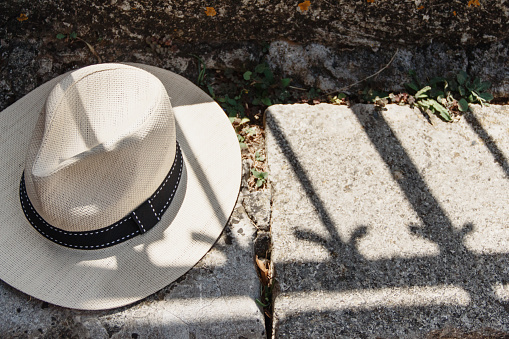 Mens Sunhat on a stone bench top view