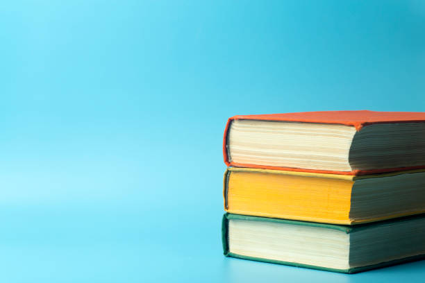 istock Books on the table. Education, reading and knowledge is backagrund. Study at university or school concept. 1271901335
