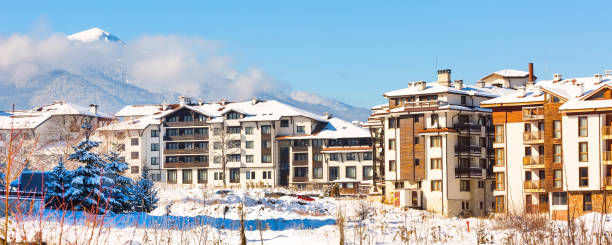 istock Houses and snow mountains in Bansko, Bulgaria 1271902282