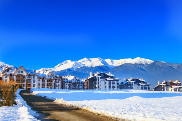 istock Houses and snow mountains panorama in Bansko, Bulgaria 1271902433