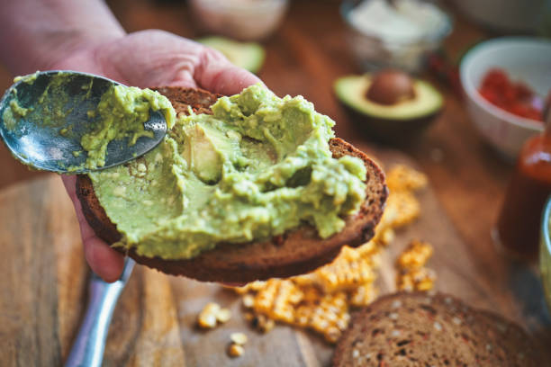 istock Avocado Sandwich with Brown Bread, Corn and Feta Cheese 1271904918