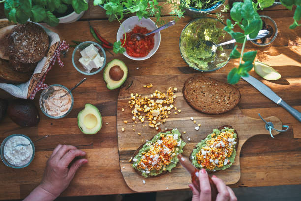 istock Avocado Sandwich with Brown Bread, Corn and Feta Cheese 1271904956