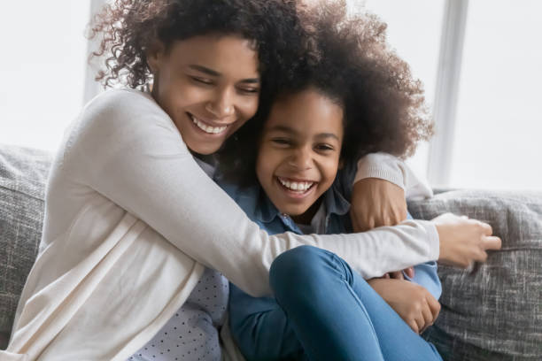 istock Affectionate caring biracial mum enjoying weekend with kid girl. 1271905981