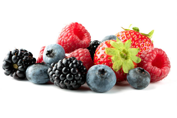 istock Ripe strawberries, raspberries,  blueberries and blackberries isolated on white background. Full depth of field 1271908720