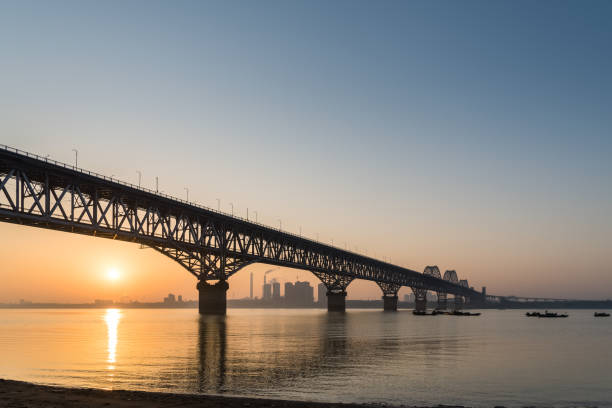 istock jiujiang yangtze river bridge in sunrise 1271915802