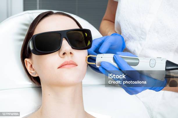 Woman Receiving Facial Beauty Treatment Removing Pigmentation Photo Intense Pulsed Light Therapy Ipl Antiaging Stock Photo - Download Image Now