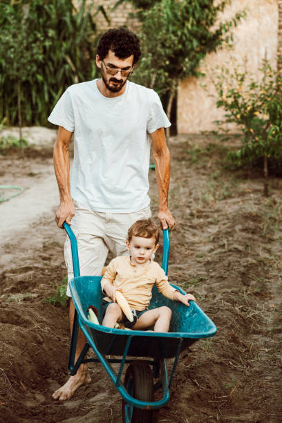 istock Family gardening together 1271917526