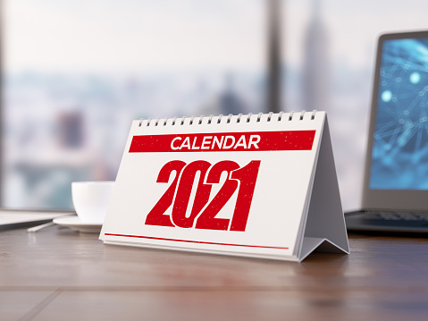 2021 Calendar at Office Desk. 3d render