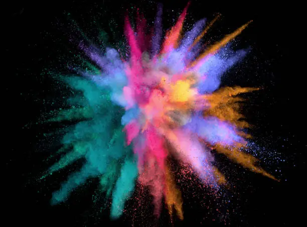 Colorful abstract powder background with color spectrum, isolated on black background