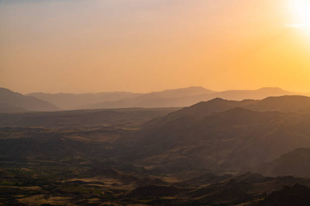 istock Beautiful sunset landscape. Panoramic view on the mountains on the sunset. 1271926555