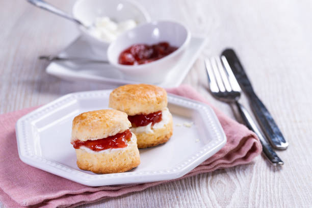 istock Scones with Strawberry Jam and Whipped Cream 1271930742