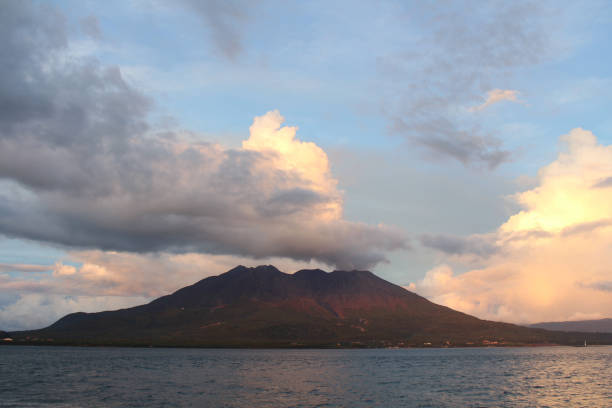 istock Sakurajima getting dark around Kamoikekaizuri Park during sunset 1271931202
