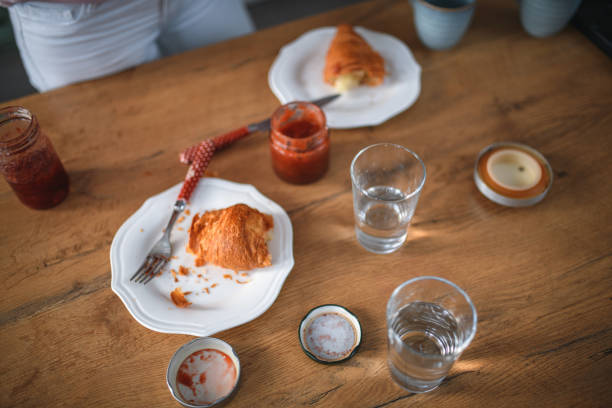 istock Coffee, croissants and jam on kitchen counter for breakfast 1271931900
