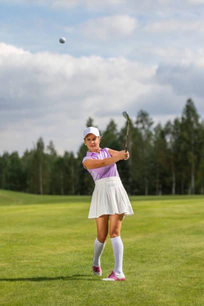 istock Golfer hitting with a club 1271932232