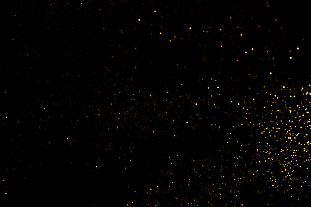 istock Golden abstract bokeh on black background. 1271934328